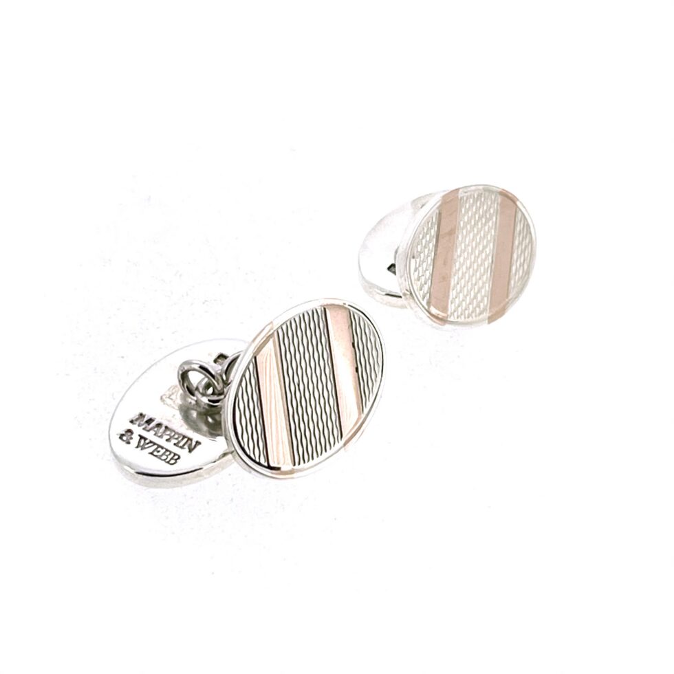 Reverse of Mappin & Webb cufflinks showing engine turning and rose gold vermeil stripe detail