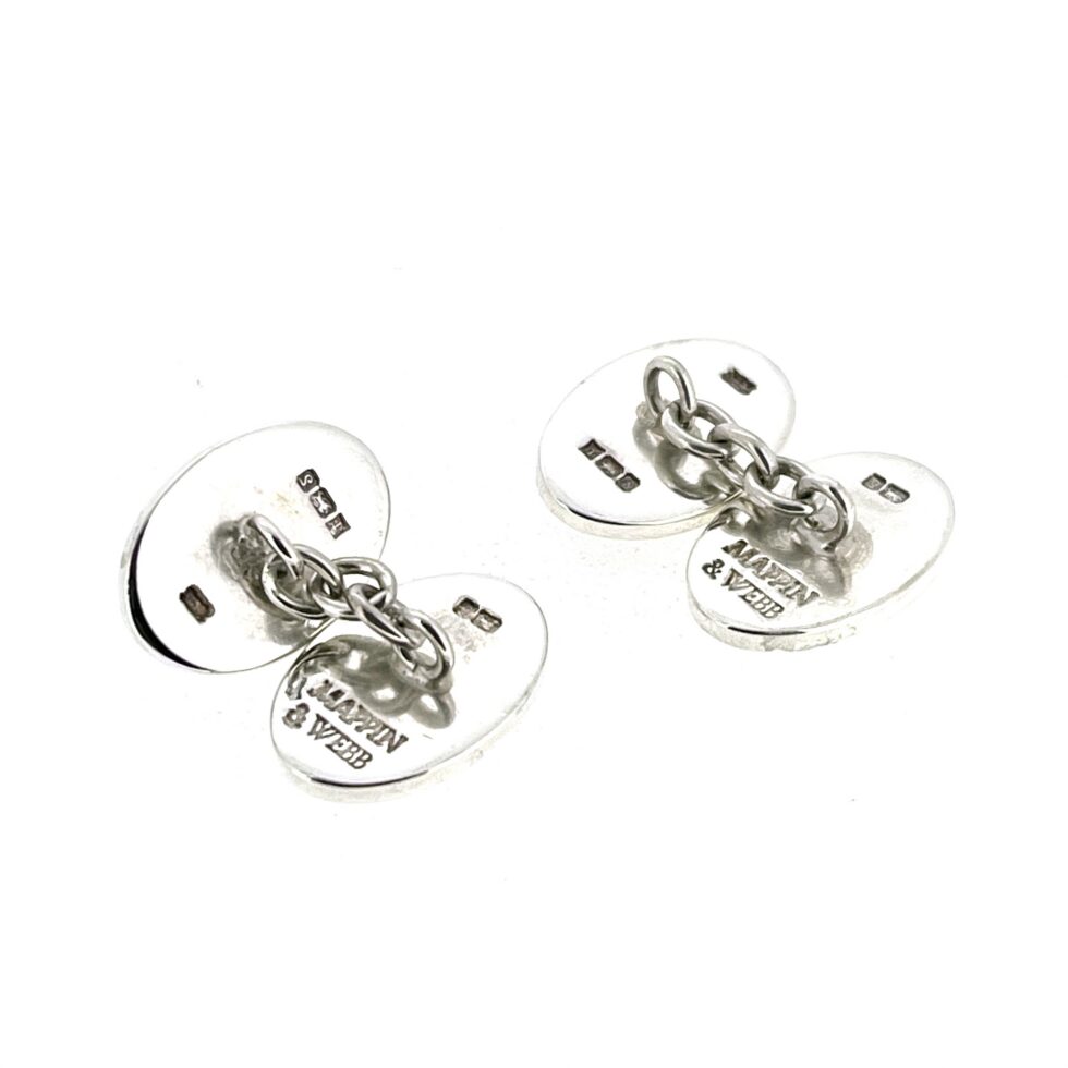 Hallmarked Mappin & Webb cufflinks in sterling silver with engine-turned reverse and diagonal rose gold bands