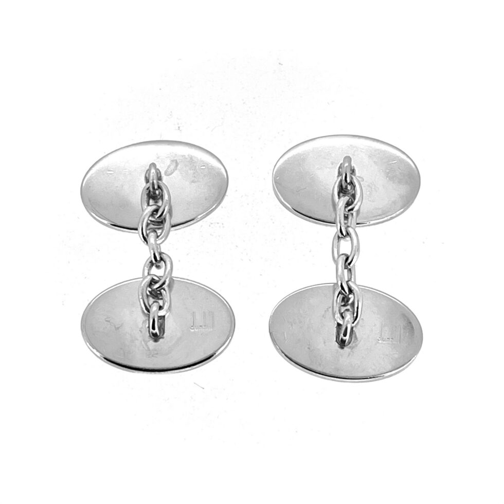 Close view of Dunhill sterling silver cufflinks with visible hallmark display