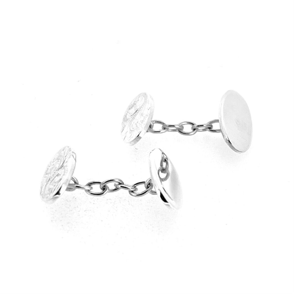 Birmingham 925 sterling silver cufflinks with one polished oval and one engraved oval